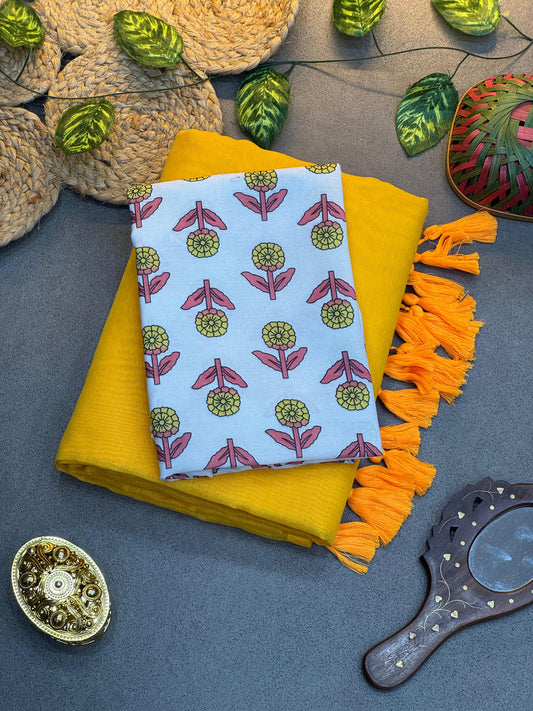 Bright Yellow Handloom Saree Paired with White Flower Printed Blouse